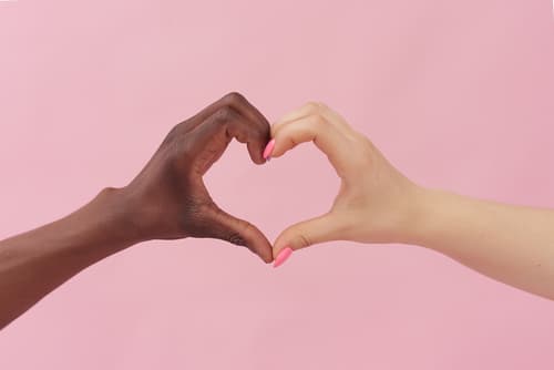 Caucasian,Woman,And,African,American,Man,Show,Heart,With,Their Cardiac Effects on populations