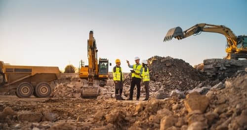 Construction,Site,With,Excavators,On,Sunny,Day:,Diverse,Team,Of Construction